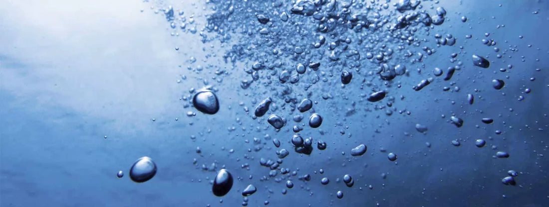 water droplets in blue water